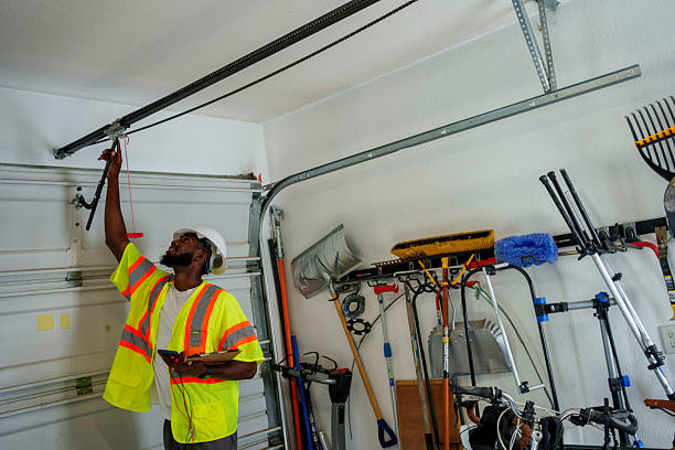 Professional Garage Door Panel Replacement technician working in Raymond, WI